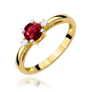 Kihlasõrmus. Gold ring with a round red ruby center stone and two small diamonds on the band._