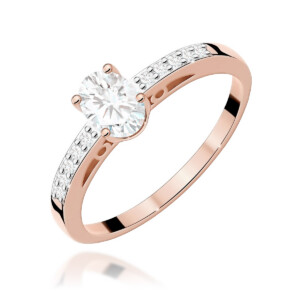 Kihlasõrmus. Rose gold engagement ring with a large central round diamond and pavé diamonds along the band.