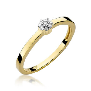Kihlasõrmus. Gold ring with a small diamond cluster on a slim polished band (engagement-style)