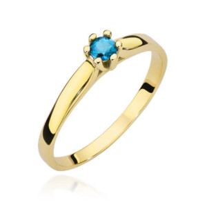 Kihlasõrmus. Gold band ring with a small round blue gemstone set in prongs