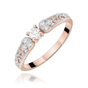 Kihlasõrmus. Rose gold ring with a central round diamond solitaire and detailed pavé filigree along the band.