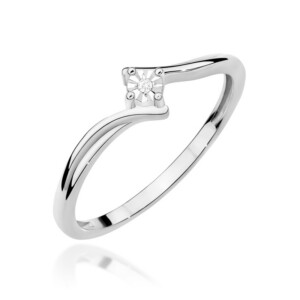 Kihlasõrmus. White gold ring with a small round diamond in a four-prong setting on a curved band, close-up.