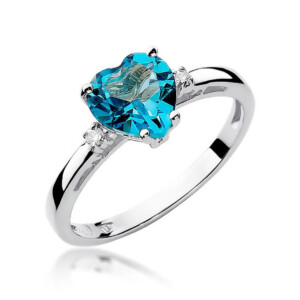 W0012 White Swiss 12ct 1-kihlasormus - Abielusõrmused.com Kihlasõrmus. Silver ring with a large oval blue gemstone held by four prongs; simple, elegant jewelry design.