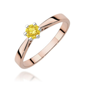 Kihlasõrmus. Rose gold ring with a yellow round-cut gemstone held by six prongs.