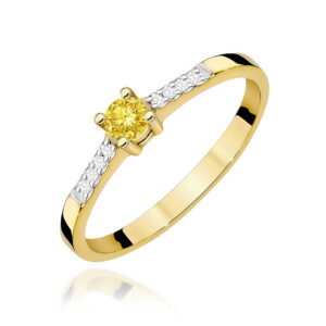 Kihlasõrmus. Gold ring with a yellow central gemstone and diamond accents along the band