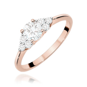 Kihlasõrmus. Rose gold ring with a large central round diamond and smaller diamonds along the setting