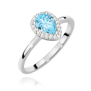 W0455 White Topaz 09ct 1-kihlasormus - Abielusõrmused.com Kihlasõrmus. Silver ring with a pear-shaped blue gemstone surrounded by a diamond halo on a polished band.